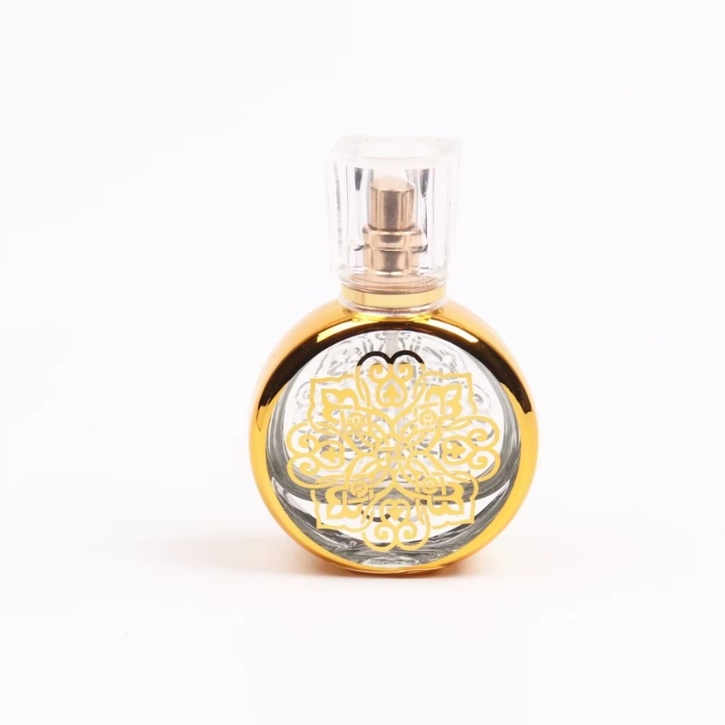 UV Engraving Empty Luxury Golden Glass 30ml Perfume Bottle With Clear Plastic Lid